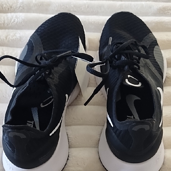 Nike Shoes - Nike Women's Black and White Athletic Running Shoes